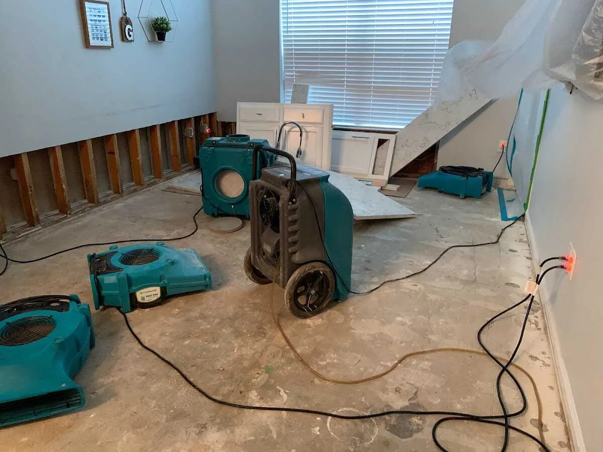 Dehumidifier in flood-cut room for Water Damage Restoration in Rotonda